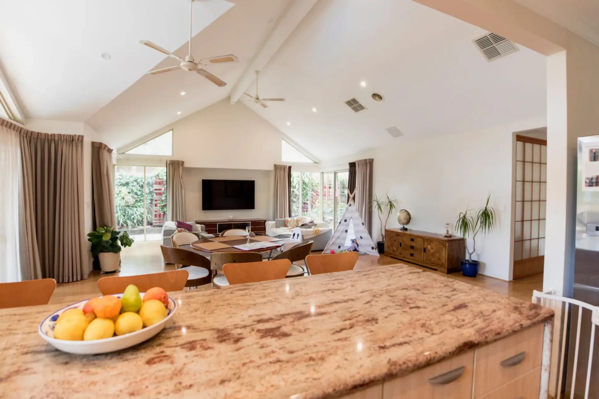 Spacious living room with dining area and decor.