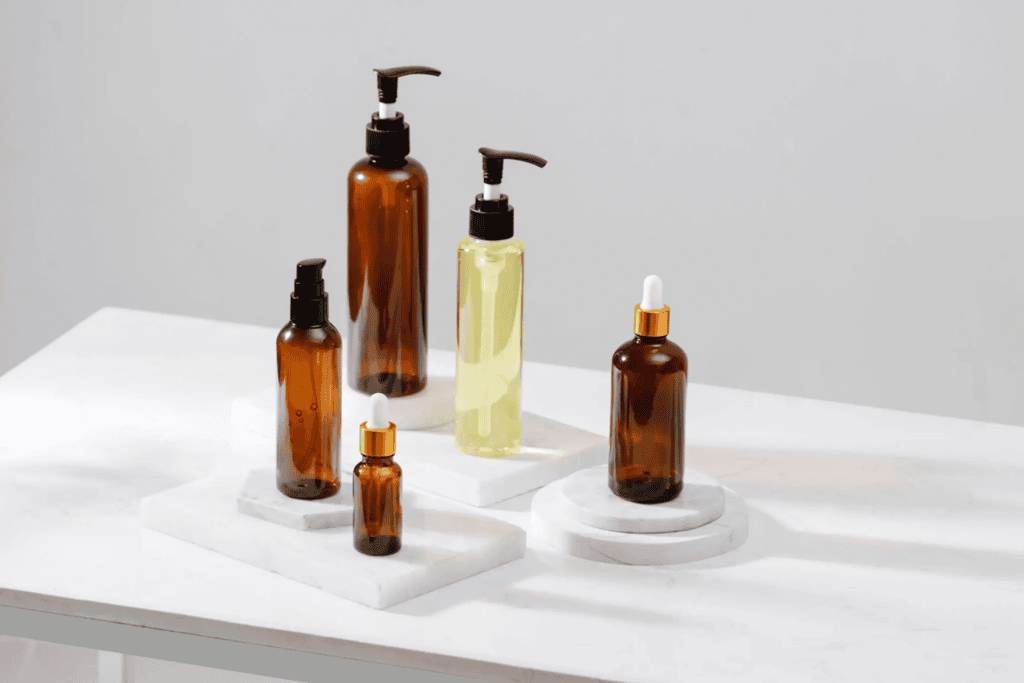 Assorted amber glass bottles on display.
